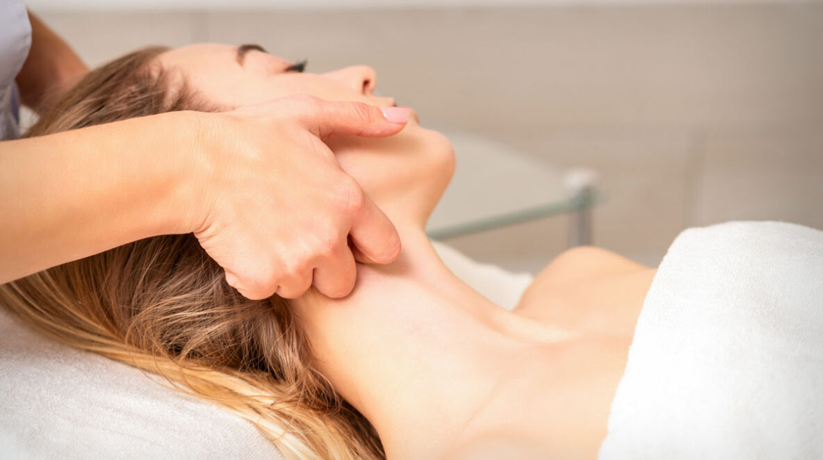 Woman getting a lymphatic drainage massage